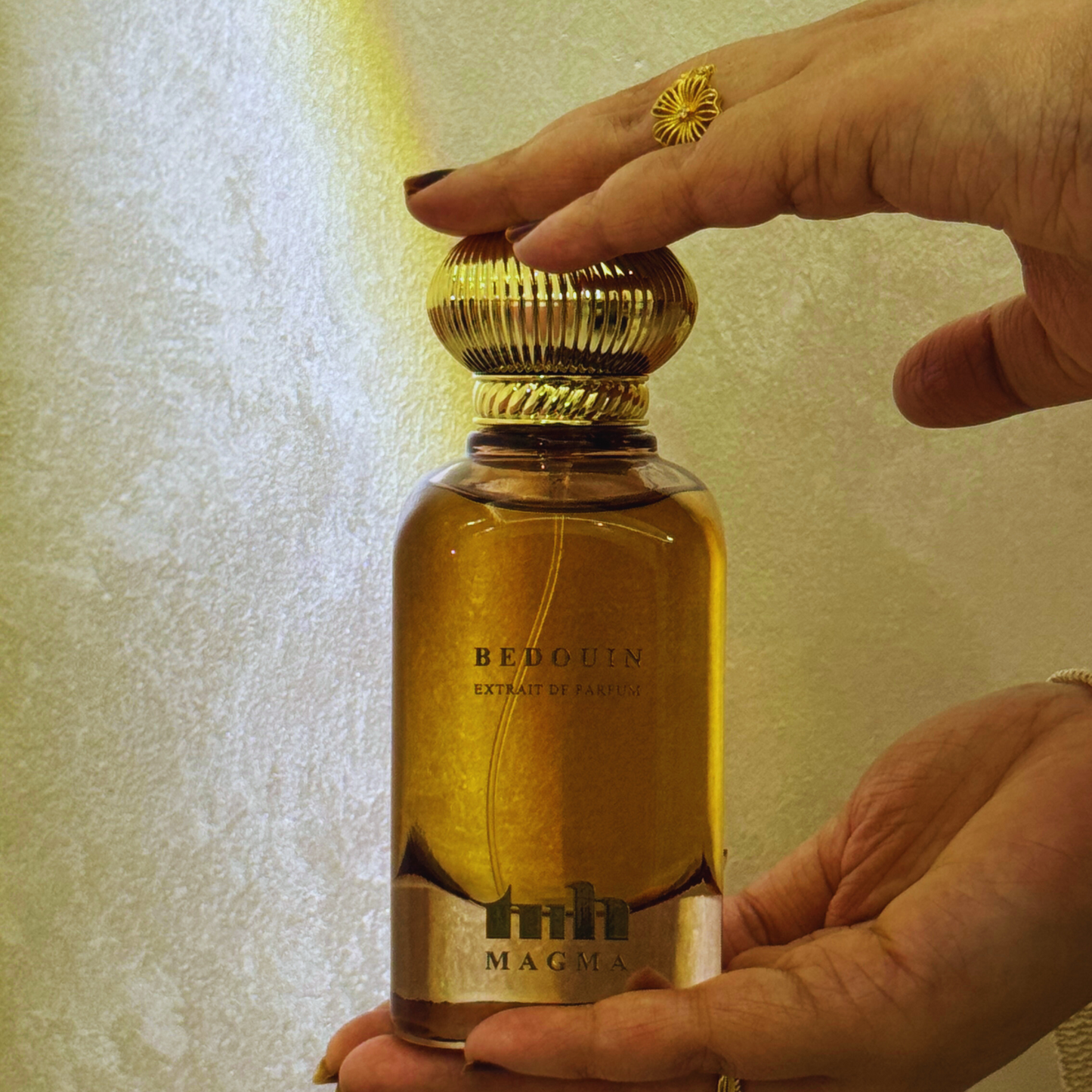 Bedouin Perfume by Magma Perfumes – a luxurious fragrance with smoky oud, incense, warm leather, and amber, capturing the essence of desert adventure and timeless wanderlust