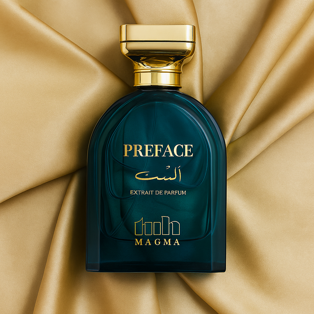 Preface unisex perfume by Magma featuring oud, incense, amber, vetiver, and leather in a luxurious teal bottle with a gold cap on champagne satin fabric.