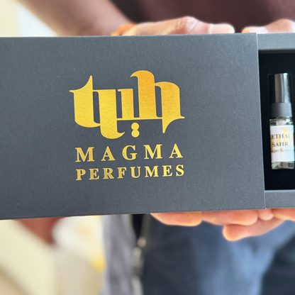 Elegant Magma Perfumes sample box with premium black and gold design, containing 5 perfume vials